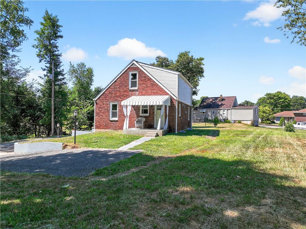 1320 Eckert Road Monaca, PA 15061 - Photo 4 of 30 a view of a house with a yard