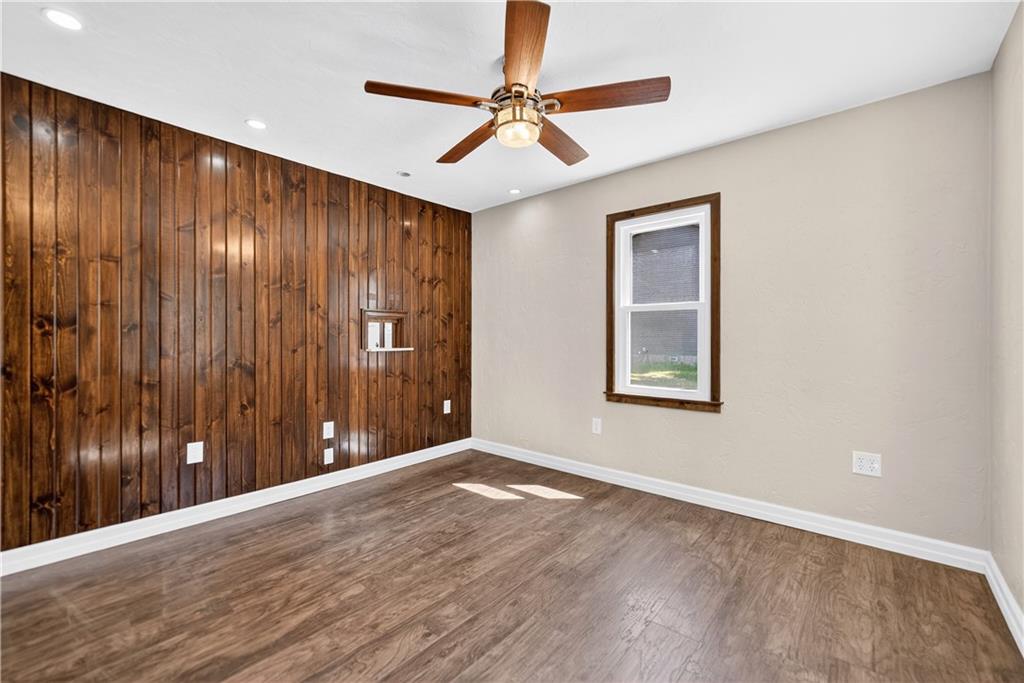 1320 Eckert Road Monaca, PA 15061 - Photo 10 of 30 a view of an empty room with wooden floor