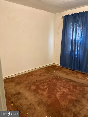 an empty room with a door
