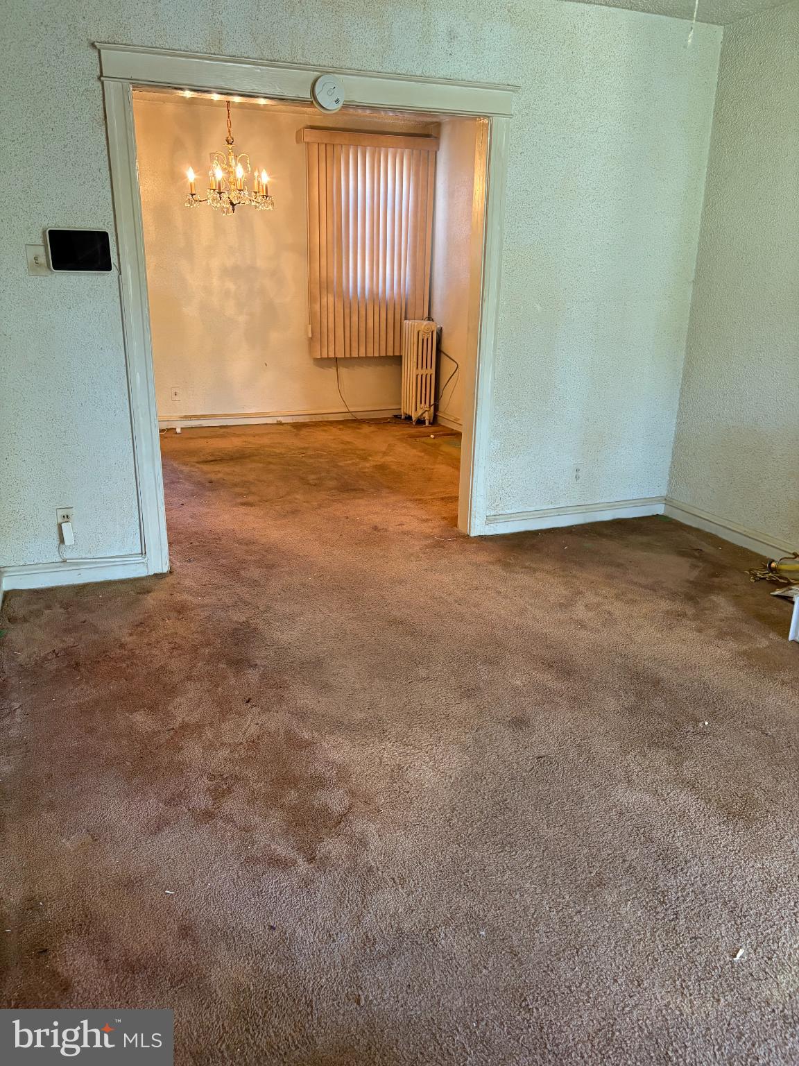 7837 Provident Street Philadelphia, PA 19150 - Photo 6 of 26 an empty room with windows