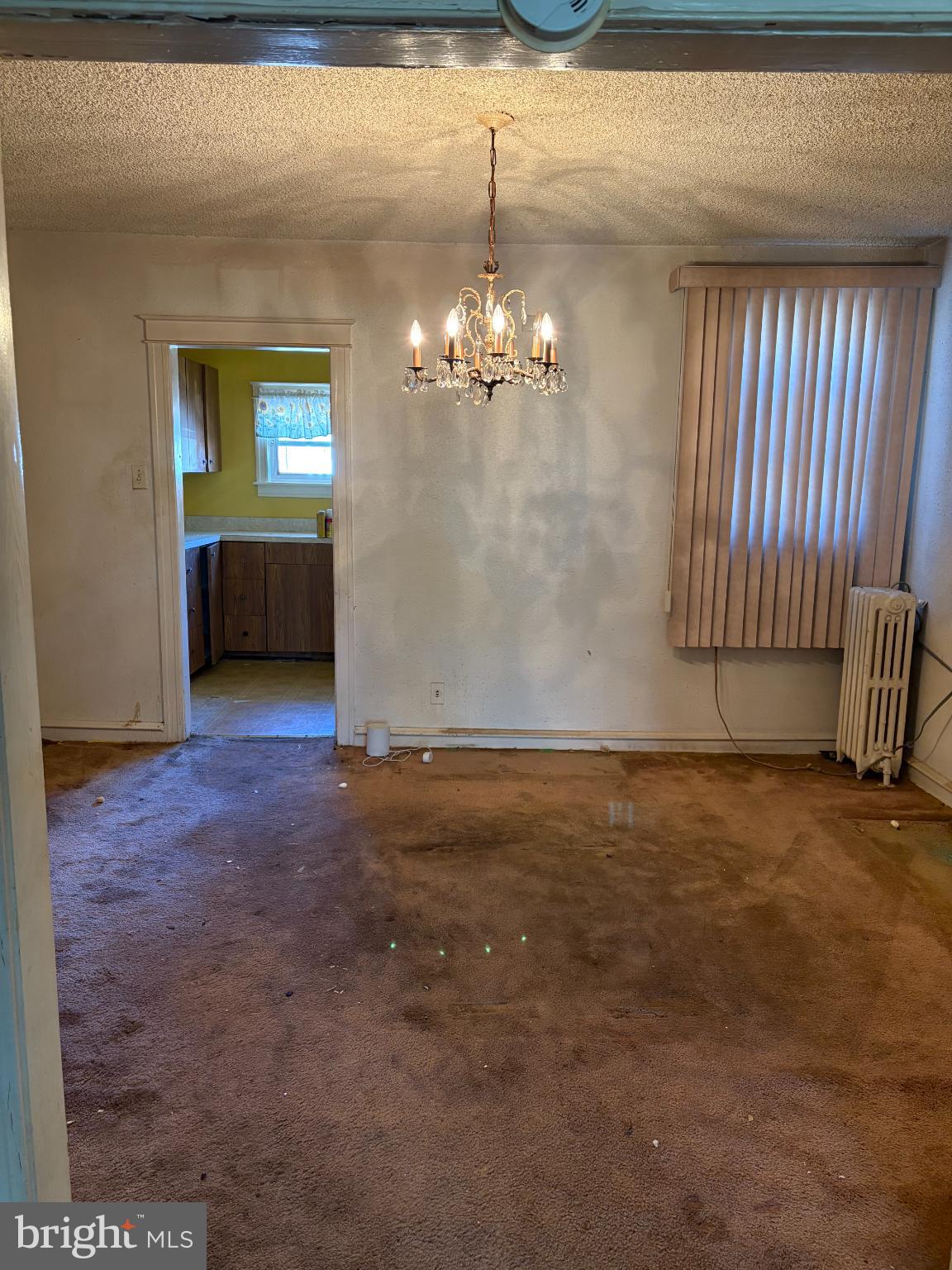 7837 Provident Street Philadelphia, PA 19150 - Photo 7 of 26 a view of a livingroom with a windows & cabinet