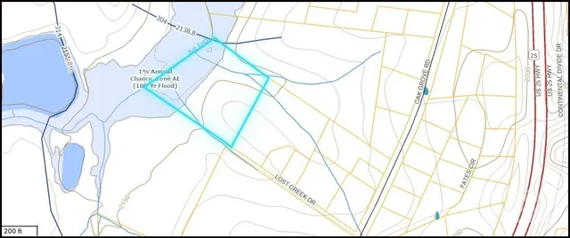 an aerial view of a house with swimming pool and outdoor space