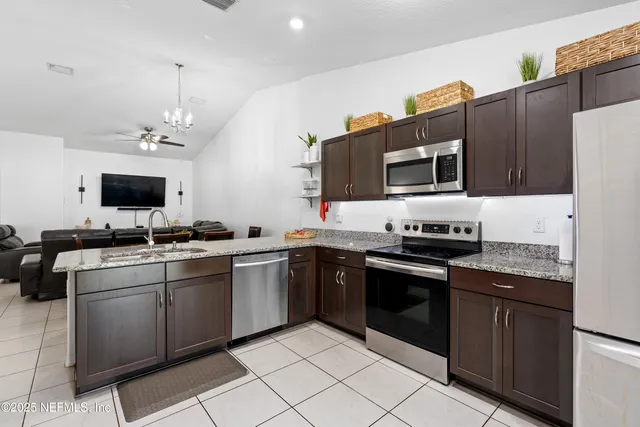 a picture of a bathroom with a shower