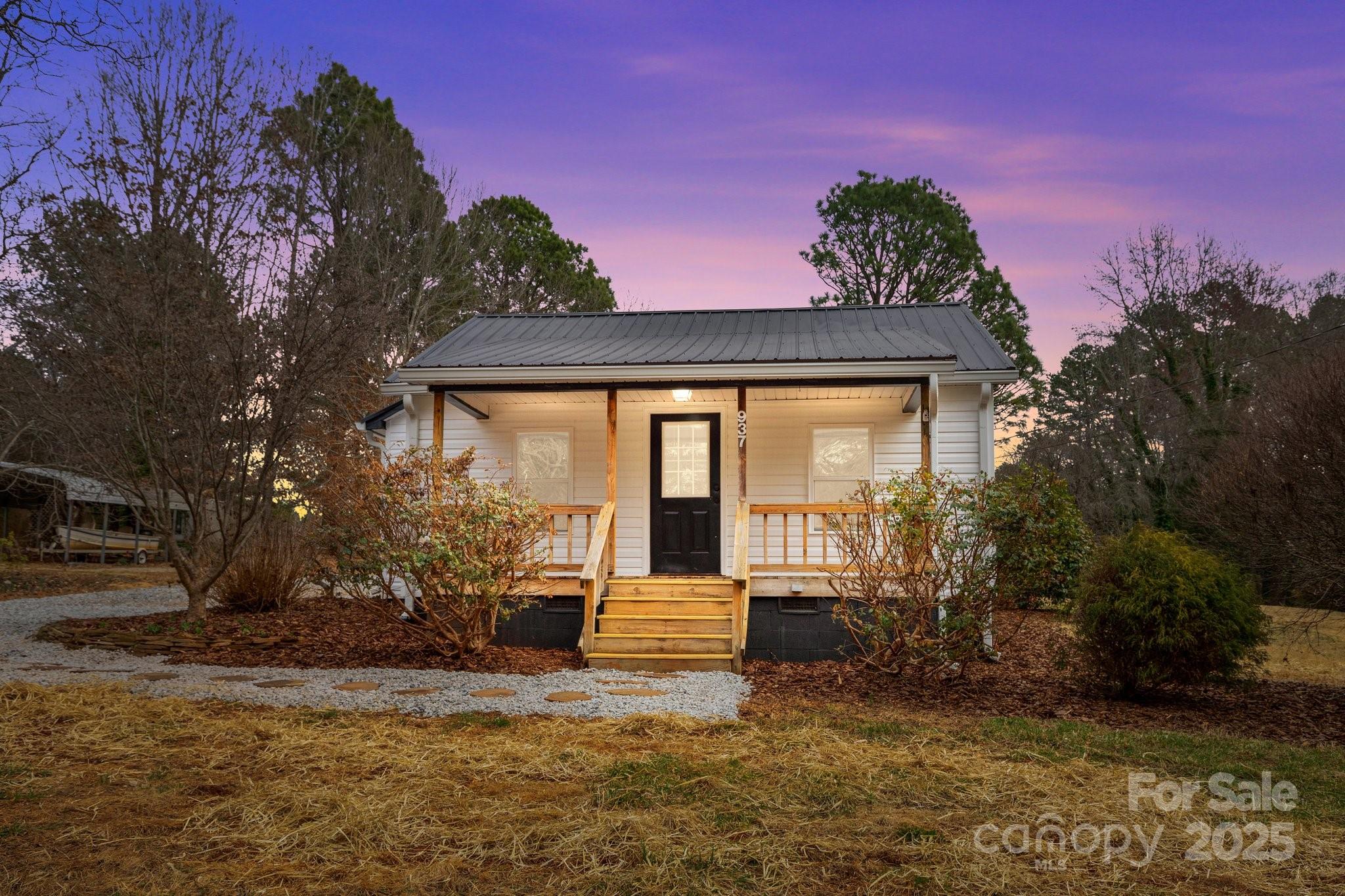 937 Gladstone Road Mocksville, NC 27028 - Photo 1 of 34 a front view of a house with a yard