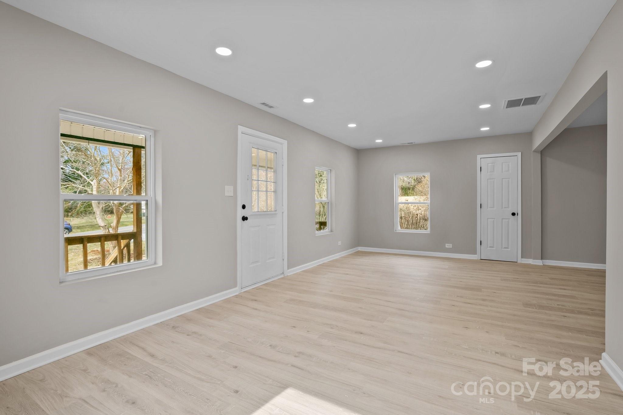 937 Gladstone Road Mocksville, NC 27028 - Photo 12 of 34 a view of an empty room with a window