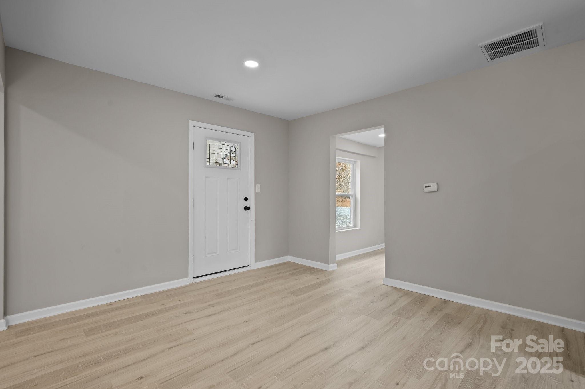 937 Gladstone Road Mocksville, NC 27028 - Photo 13 of 34 a view of an empty room