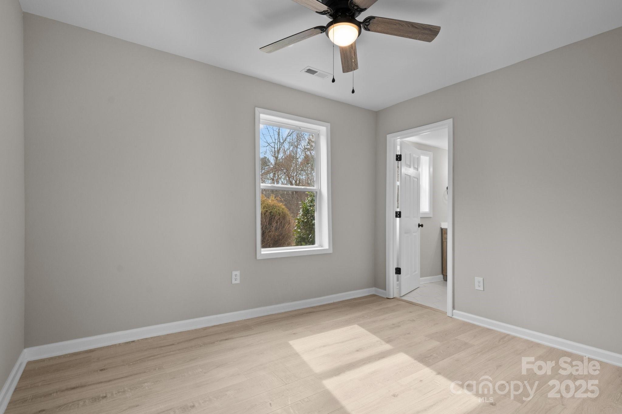 937 Gladstone Road Mocksville, NC 27028 - Photo 20 of 34 a view of an empty room with a window