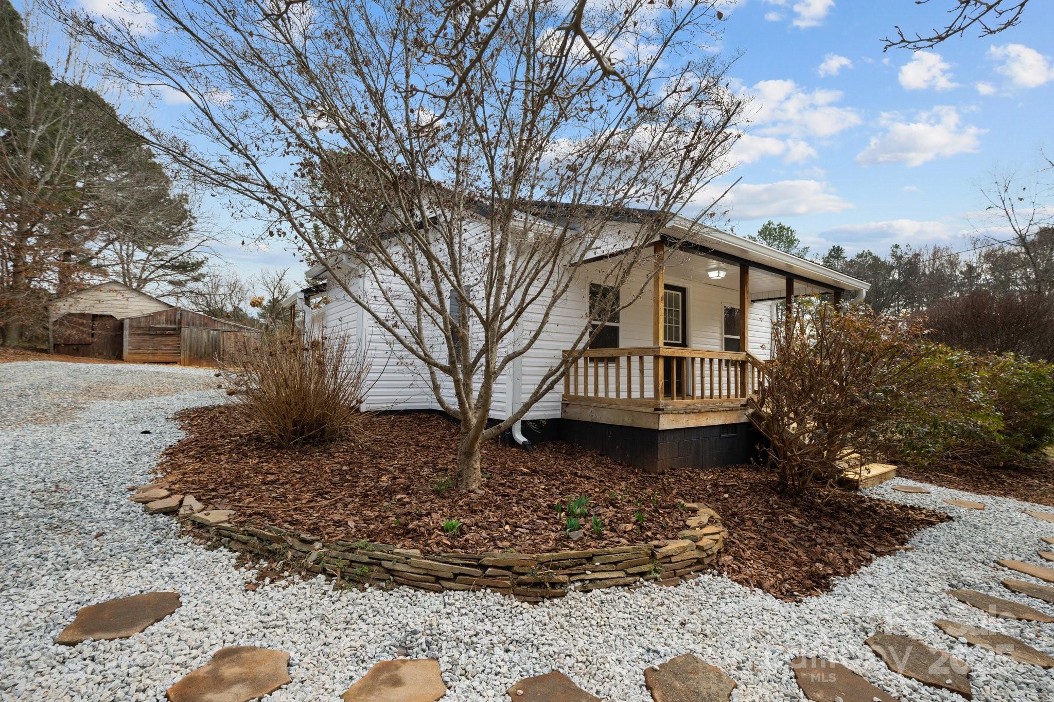937 Gladstone Road Mocksville, NC 27028 - Photo 33 of 34 a front view of a house with garden