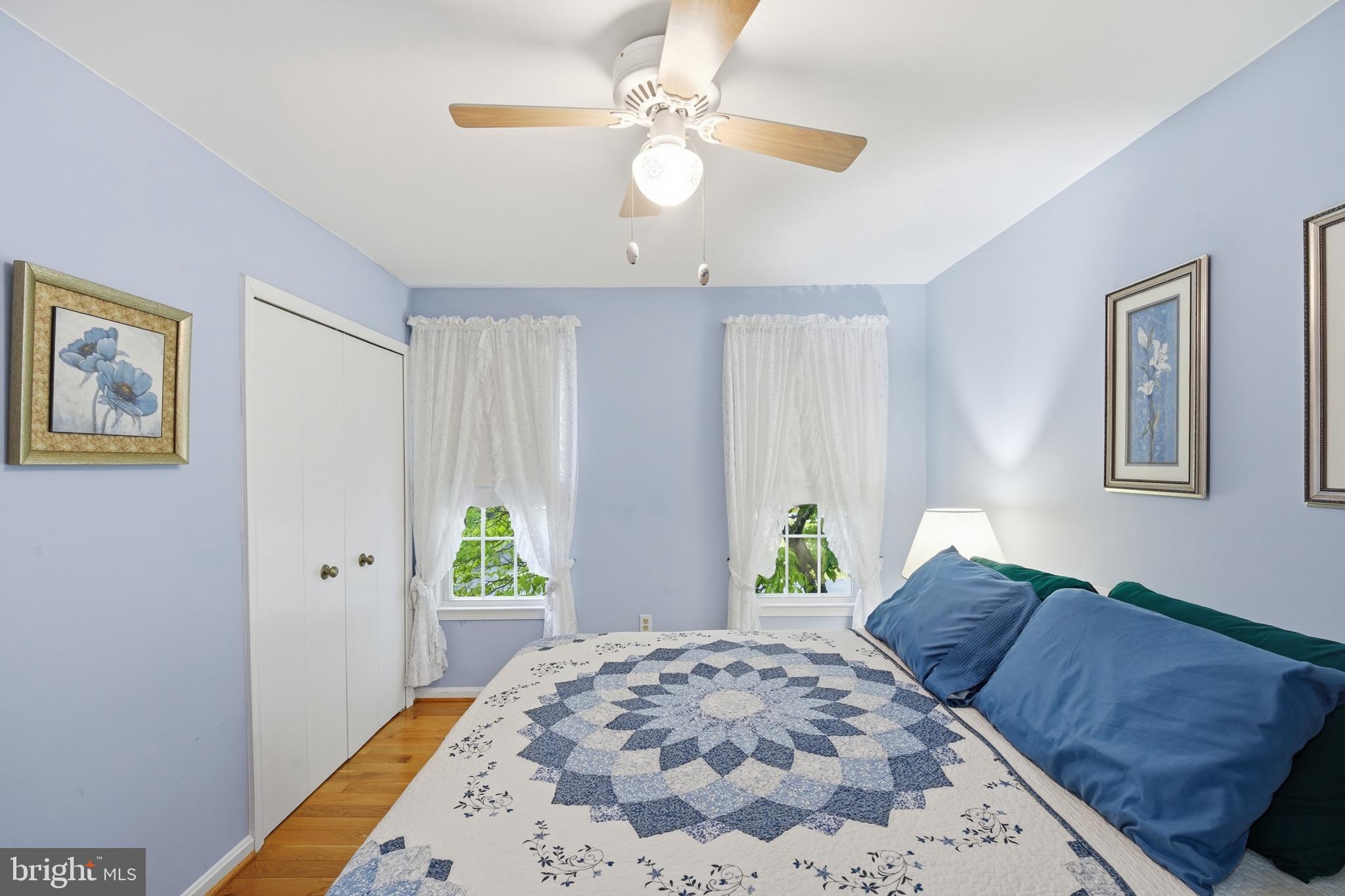 2304 Hidden Valley Lane Silver Spring, MD 20904 - Photo 23 of 54 a bedroom with a bed and a window