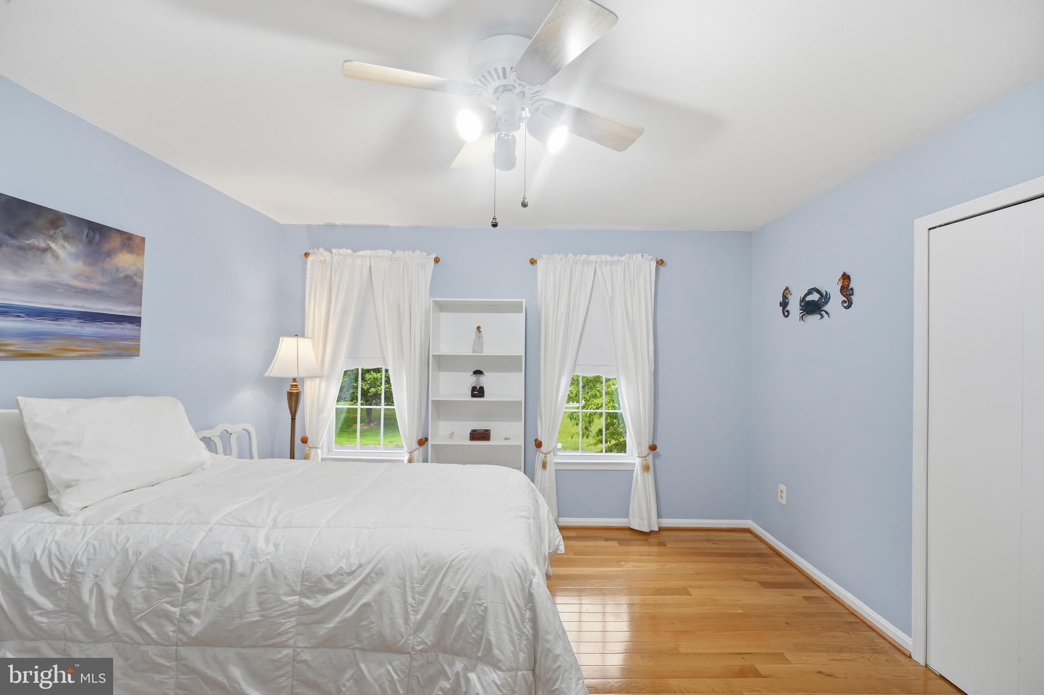 2304 Hidden Valley Lane Silver Spring, MD 20904 - Photo 26 of 54 a bedroom with a bed and a window
