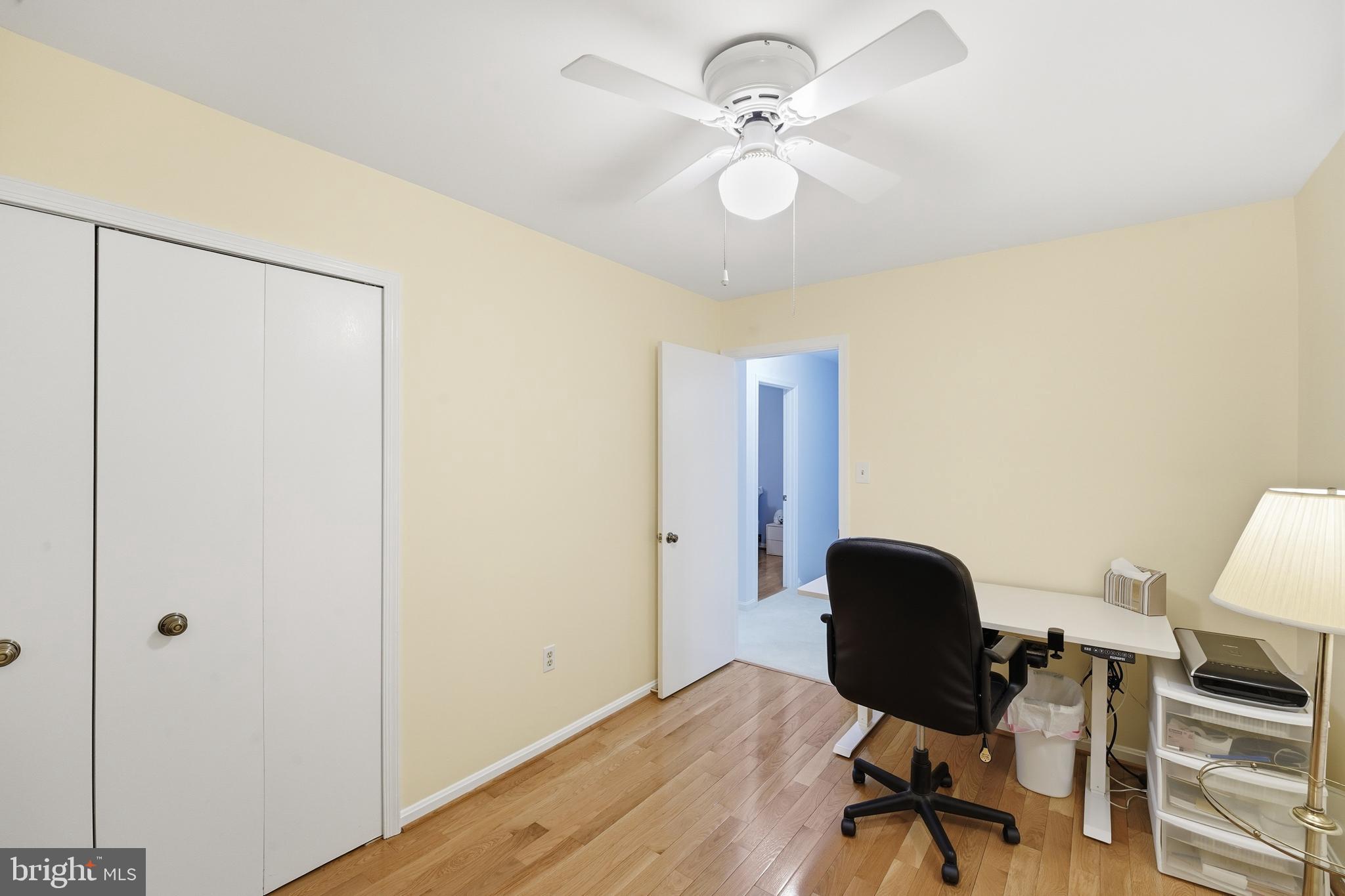 2304 Hidden Valley Lane Silver Spring, MD 20904 - Photo 29 of 54 a view of a workspace with furniture and a window