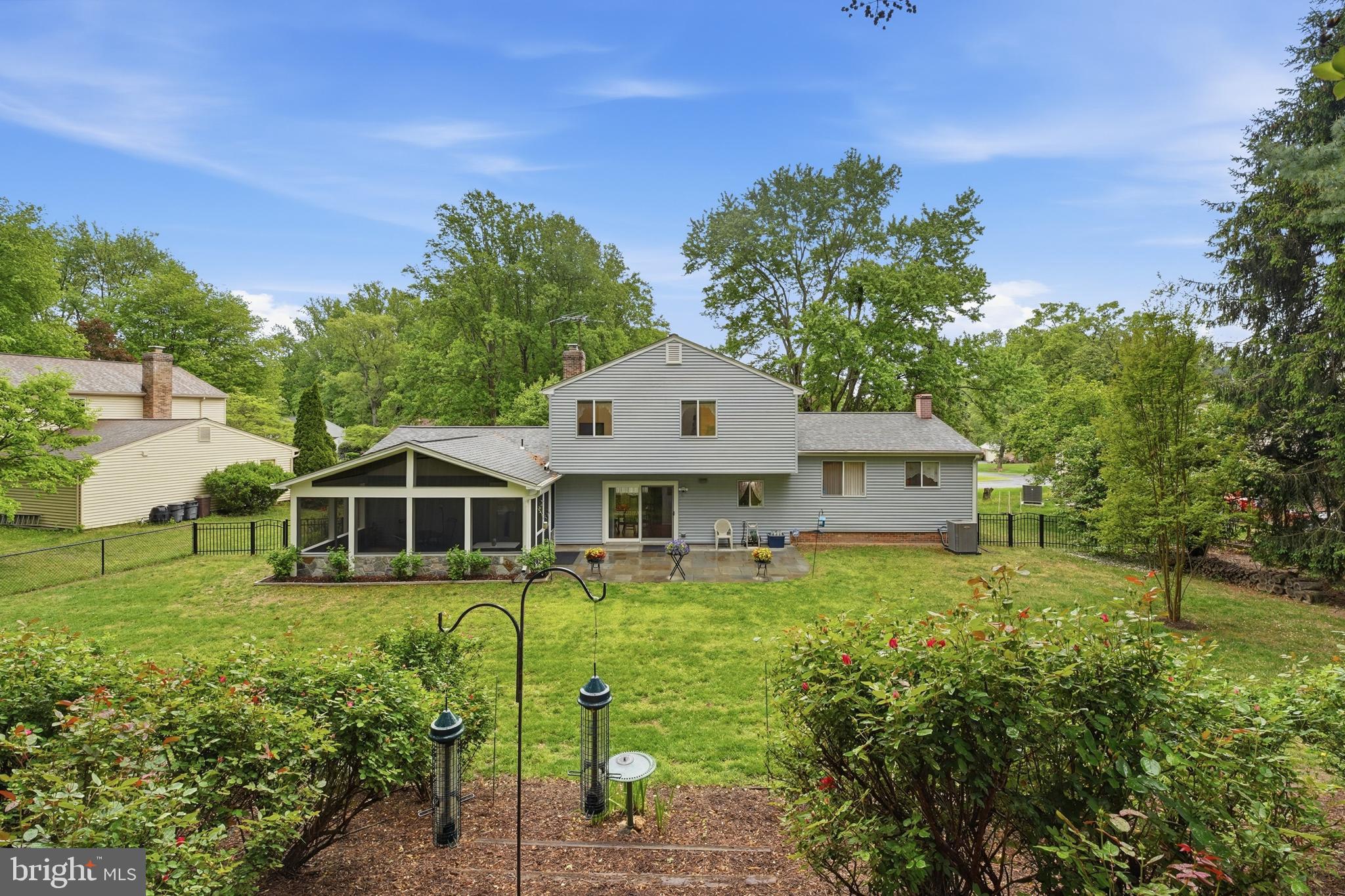 2304 Hidden Valley Lane Silver Spring, MD 20904 - Photo 49 of 54 a house with green field in front of it