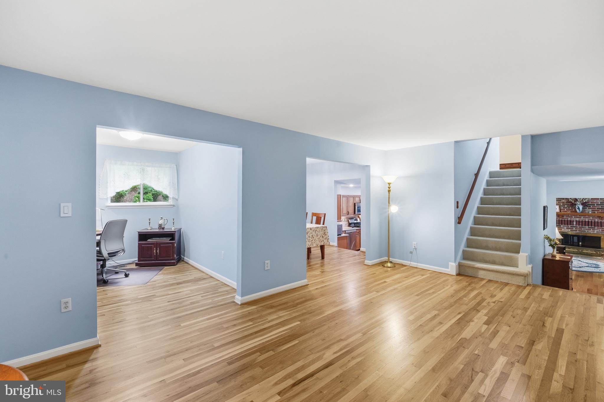 2304 Hidden Valley Lane Silver Spring, MD 20904 - Photo 5 of 54 a view of a livingroom with wooden floor and furniture