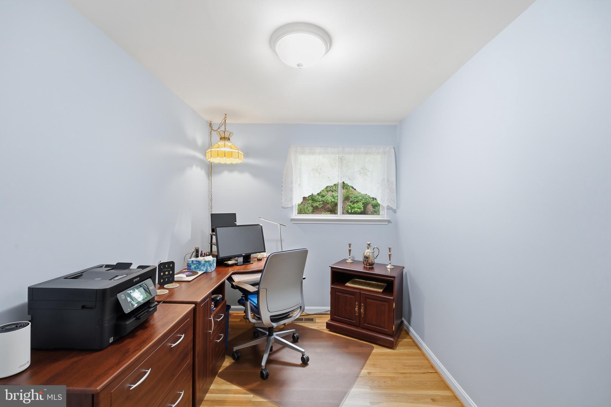2304 Hidden Valley Lane Silver Spring, MD 20904 - Photo 8 of 54 a view of a workspace with furniture
