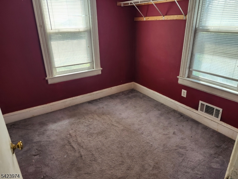 5 Locust Street Wanaque, NJ 07420 - Photo 15 of 23 a view of an empty room with a window