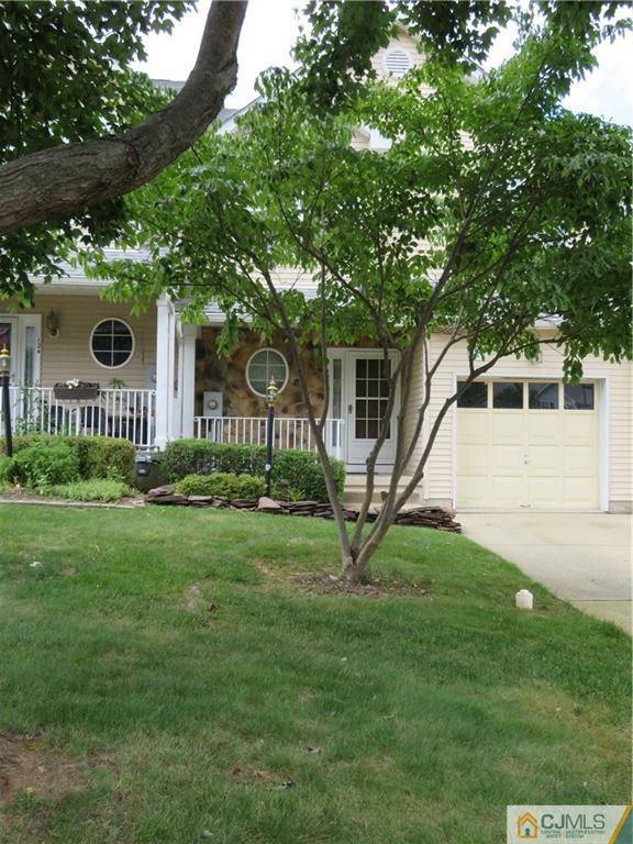 125 Castleton Road Princeton, NJ 08540 - Photo 1 of 24 a house with green field in front of it