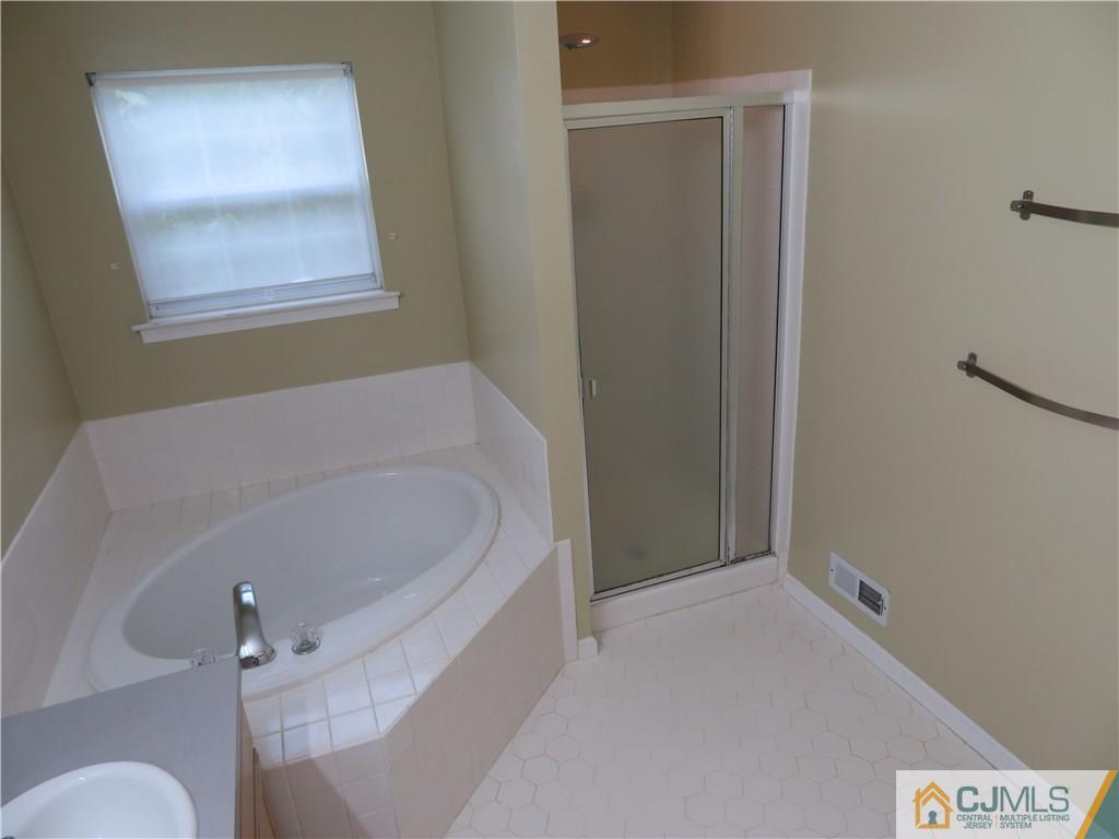 125 Castleton Road Princeton, NJ 08540 - Photo 11 of 24 a bathroom with a bathtub