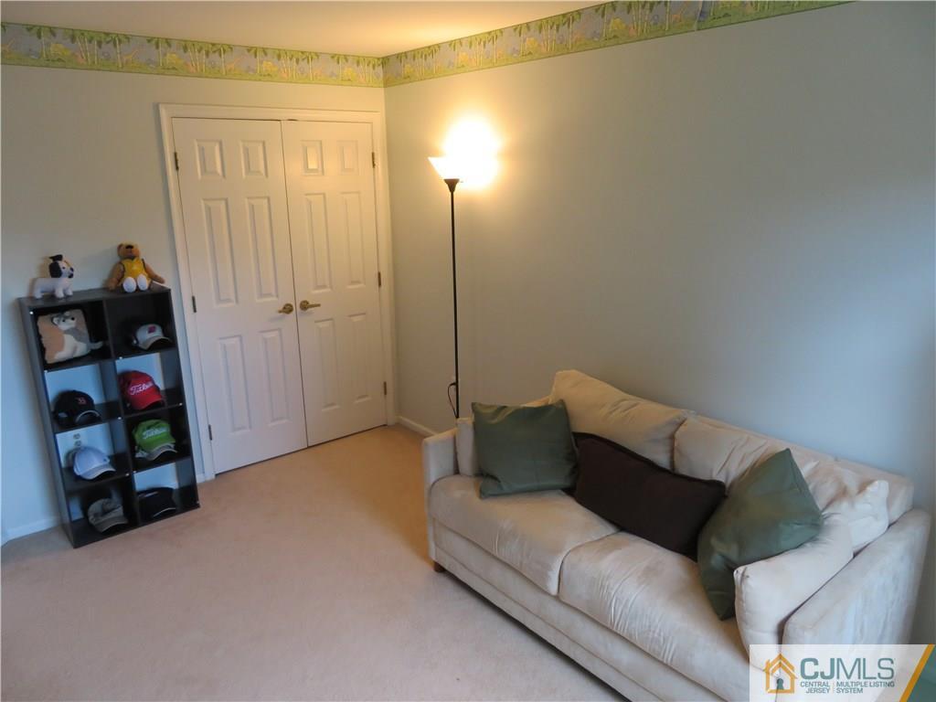 125 Castleton Road Princeton, NJ 08540 - Photo 13 of 24 a living room with furniture and a window