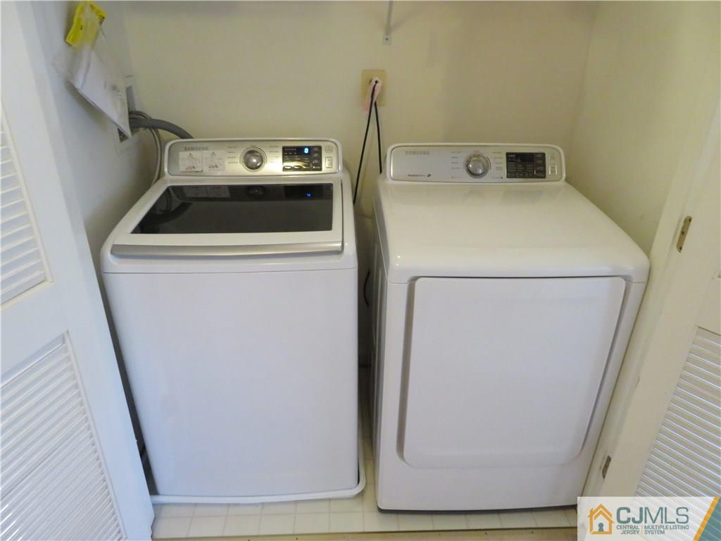 125 Castleton Road Princeton, NJ 08540 - Photo 16 of 24 a utility room with dryer and washer