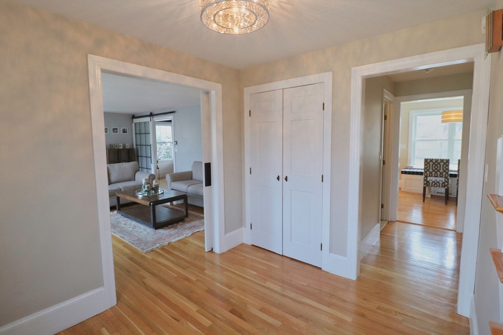 341 Reedsdale Road Milton, MA 02186 - Photo 3 of 28 a bedroom with furniture and a wooden floor