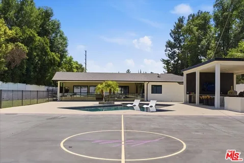 a view of a house with a patio
