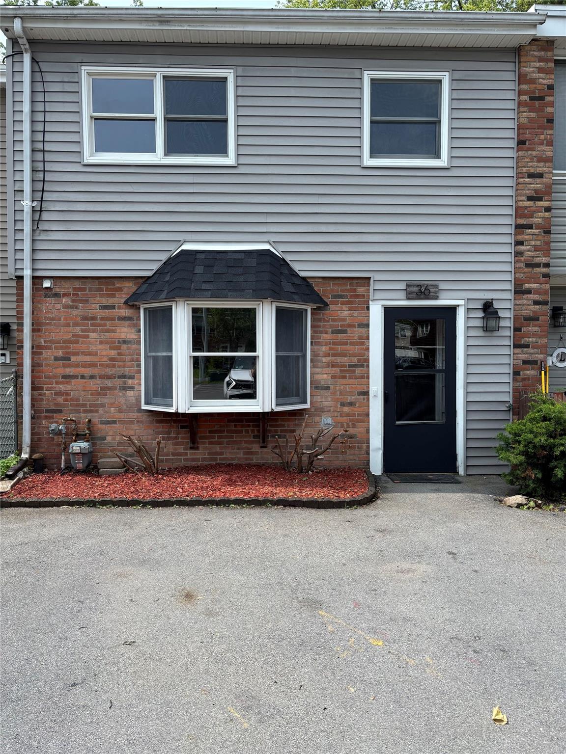 View of front of home with brick siding