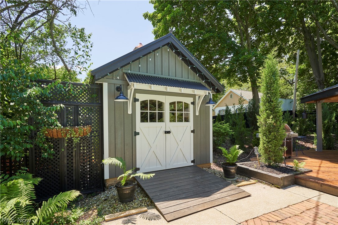 874 Merriman Road Akron, OH 44303 - Photo 47 of 50 Newer pool shed woith storage and even dimmable lighting!