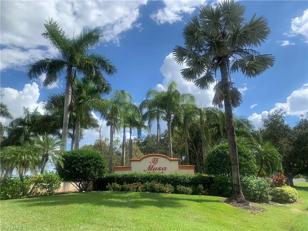 13521 Eagle Ridge Drive, Unit 121 Fort Myers, FL 33912 - Photo 11 of 12 a view of a garden with a house