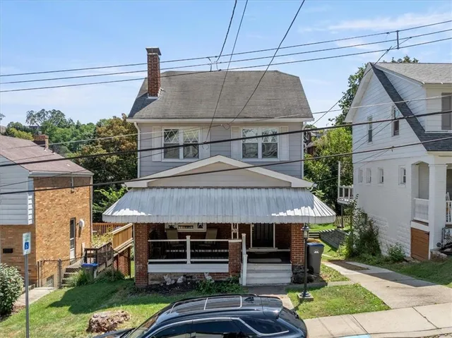 a aerial view of a house roof deck