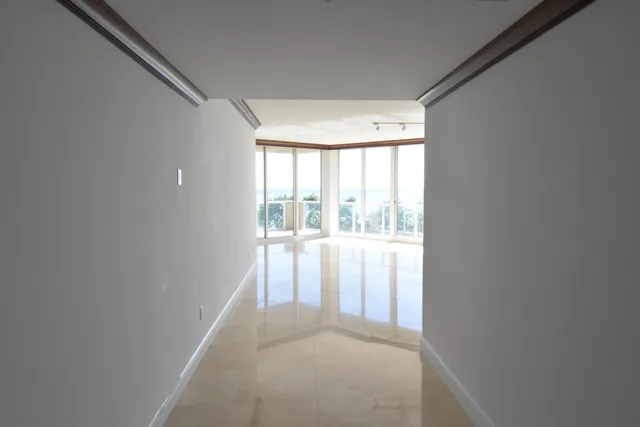 a view of a room with a large window