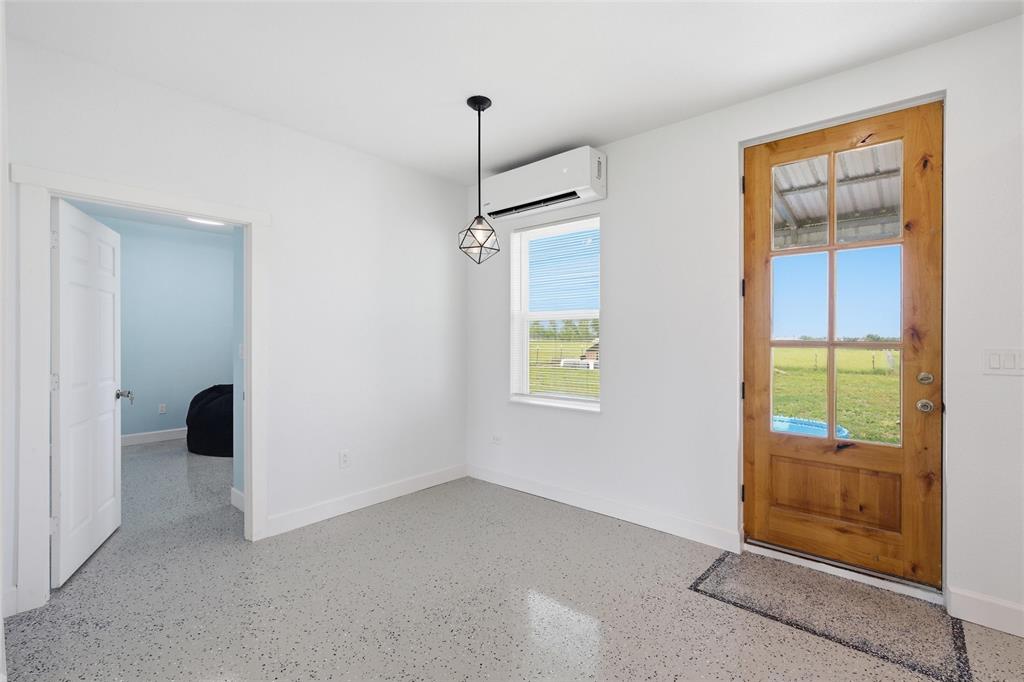 151 Kasberg Road Leroy, TX 76691 - Photo 17 of 40 a view of an empty room with a window