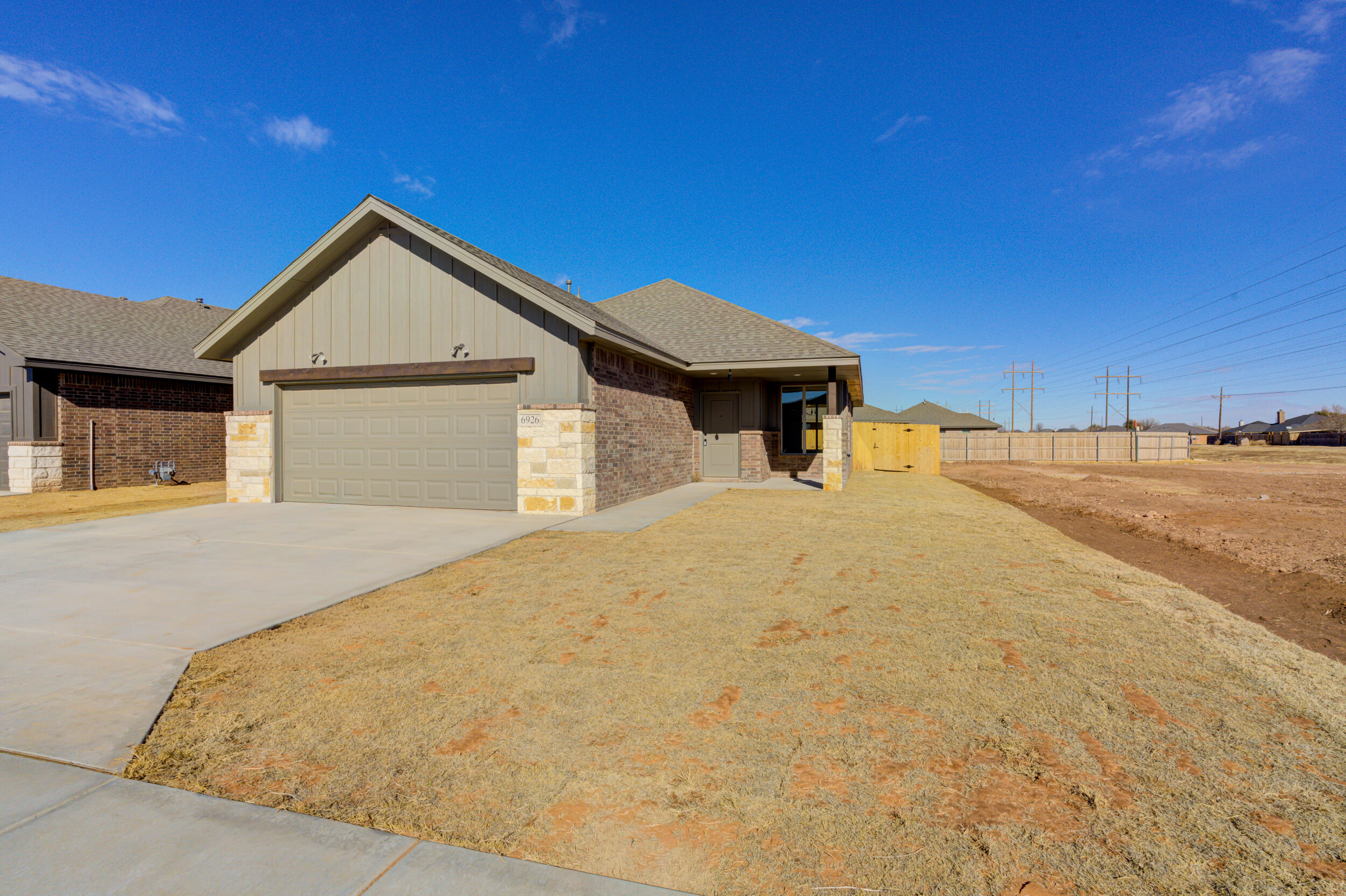 6926 12th Street Lubbock, TX 79416 - Photo 3 of 39 a view of outdoor space yard and garage