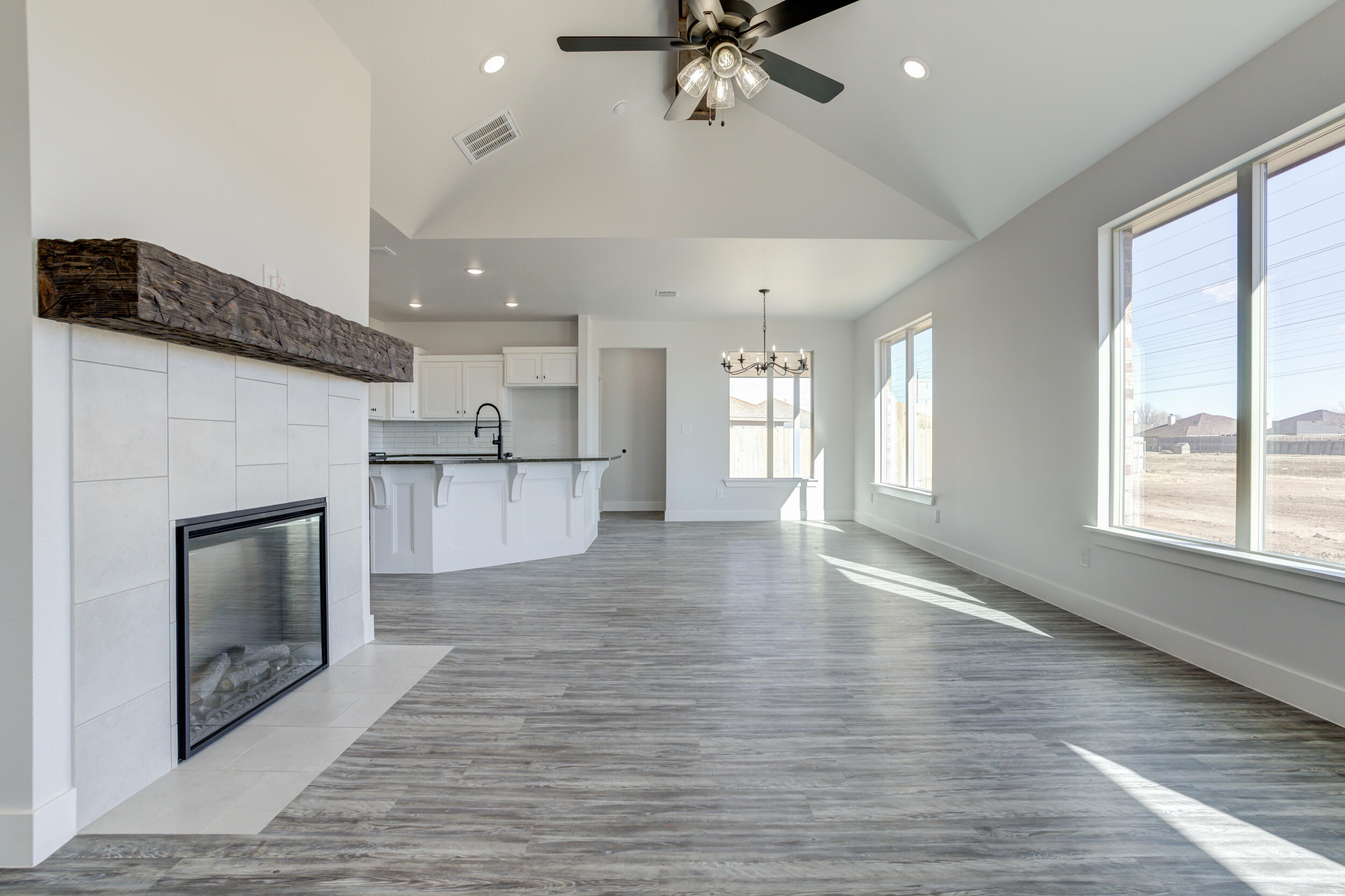 6926 12th Street Lubbock, TX 79416 - Photo 5 of 39 a view of a kitchen and an empty room