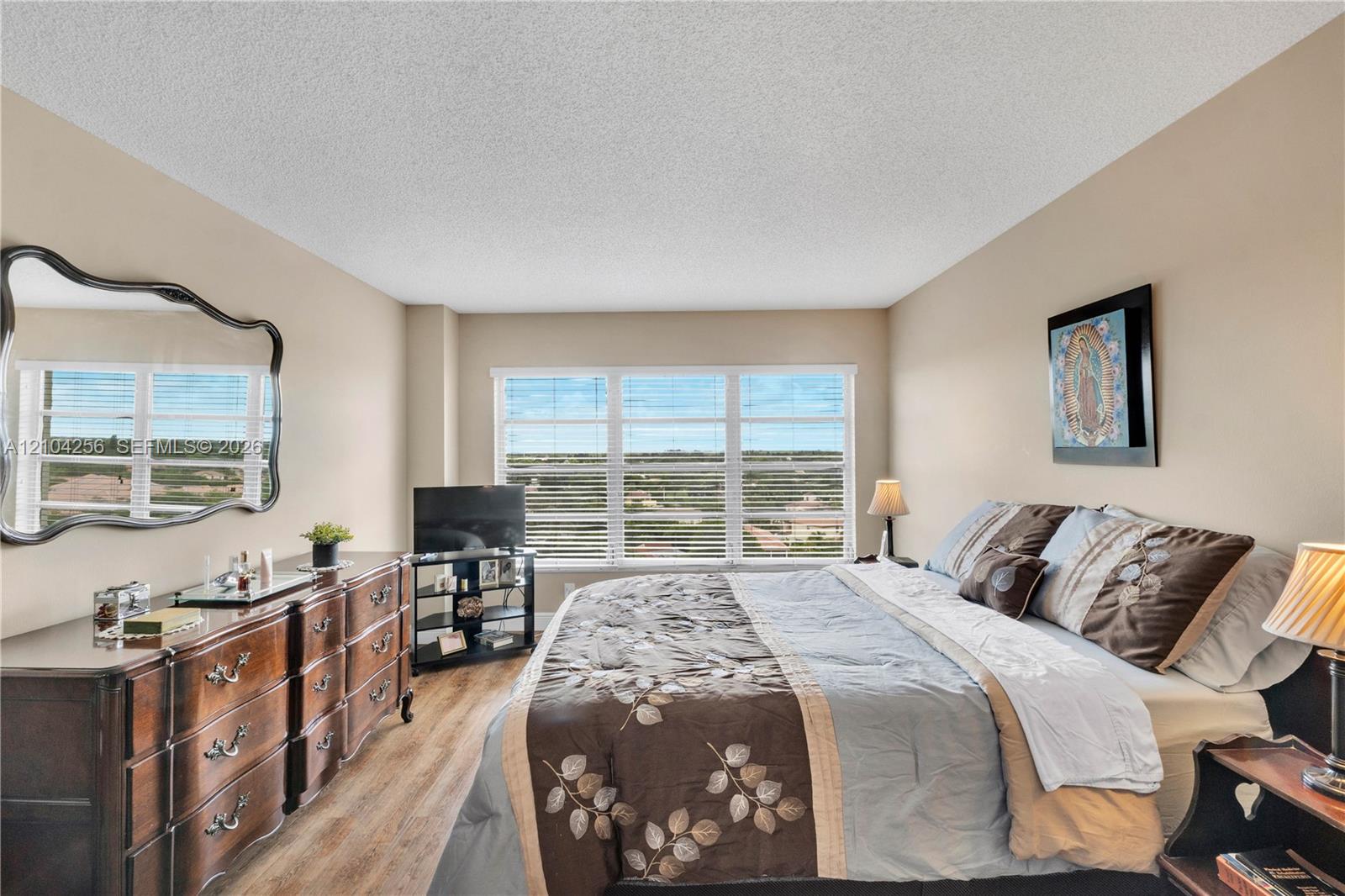 10777 West Sample Road, Unit 907 Coral Springs, FL 33065 - Photo 16 of 45 Master Bedroom
