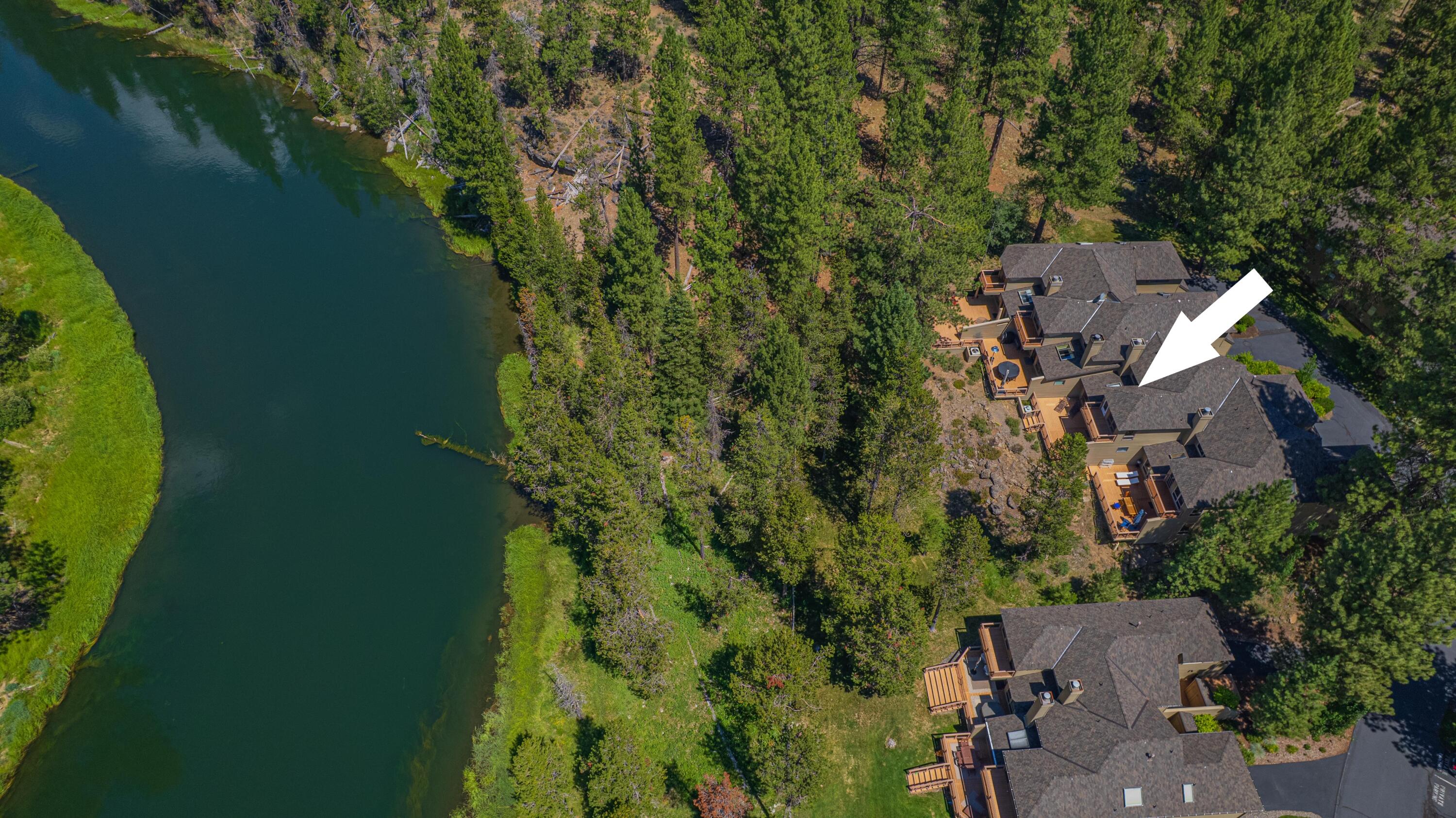 17674 Bittern Lane, Unit 7 Sunriver, OR 97707 - Photo 1 of 43 Aerial view of the River Village community in Sunriver, Oregon, showing the featured condominium location along the Deschutes River, surrounded by mat