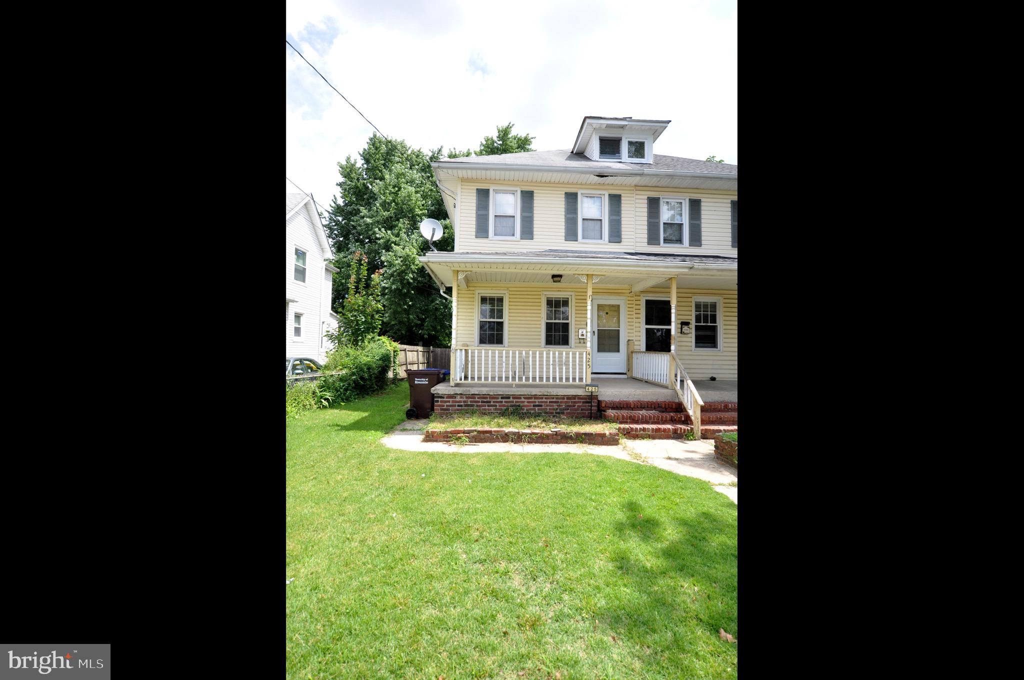 425 Delaware Avenue Riverside, NJ 08075 - Photo 3 of 33 a view of a house with a yard