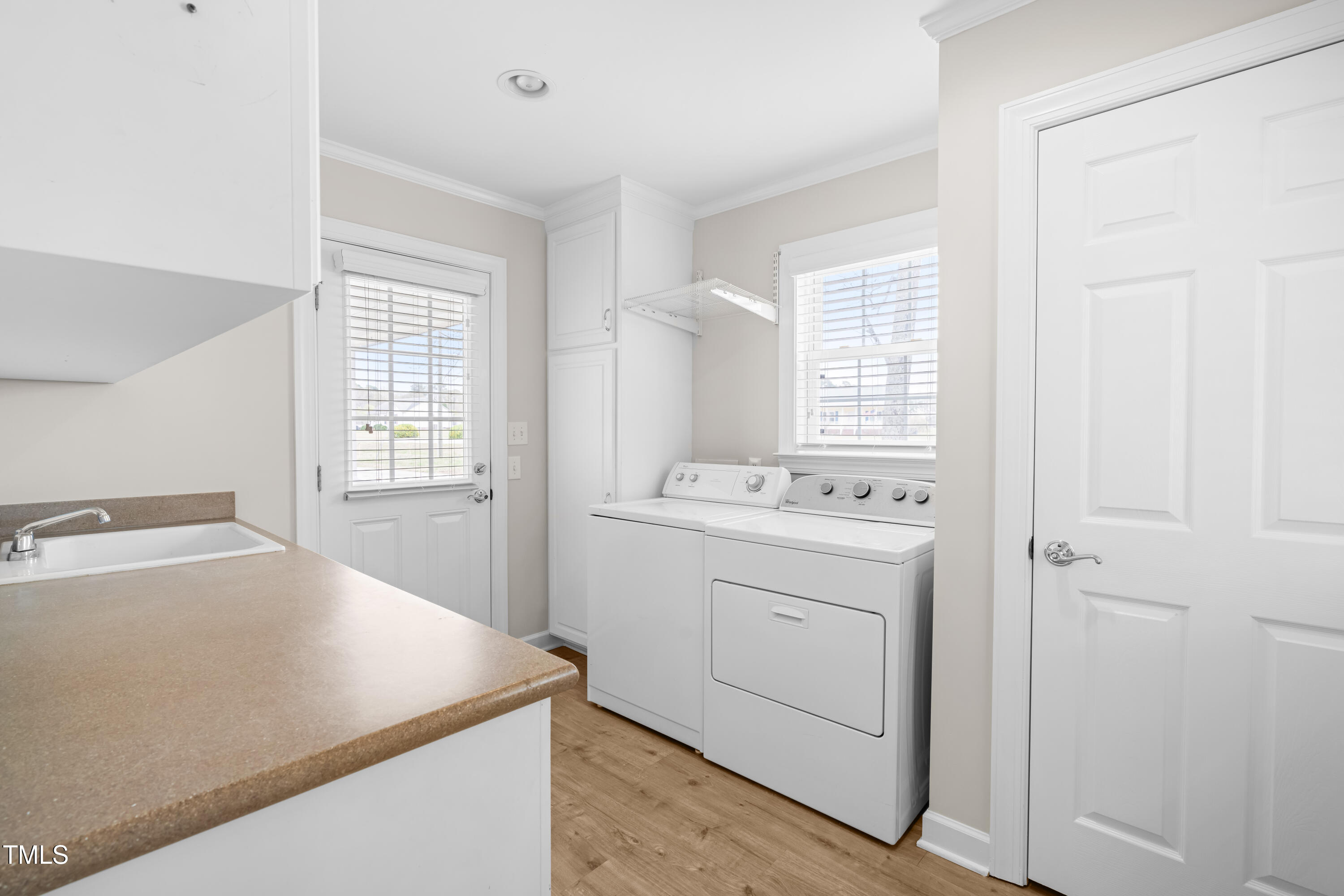 44 Loop Road Archer Lodge, NC 27527 - Photo 15 of 48 a utility room with dryer and washer