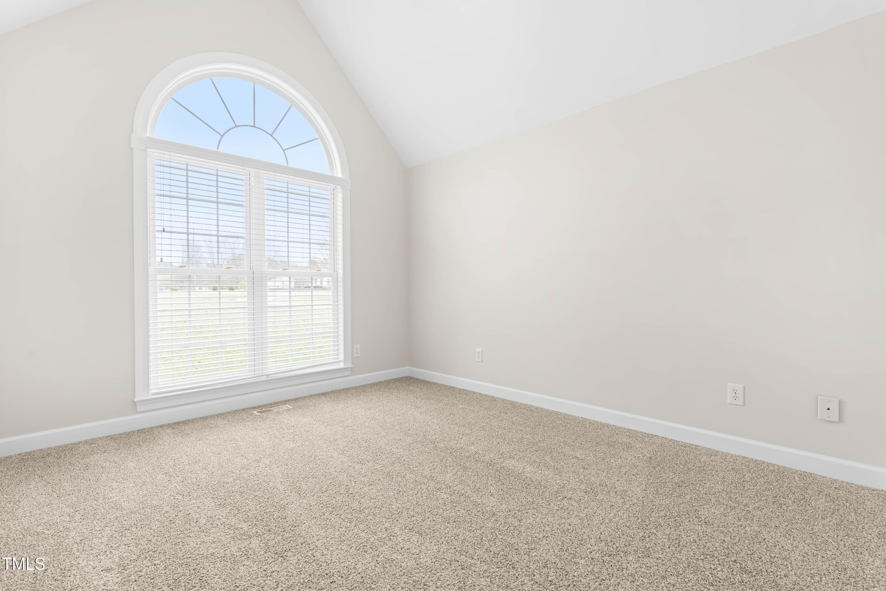 44 Loop Road Archer Lodge, NC 27527 - Photo 27 of 48 an empty room with a window