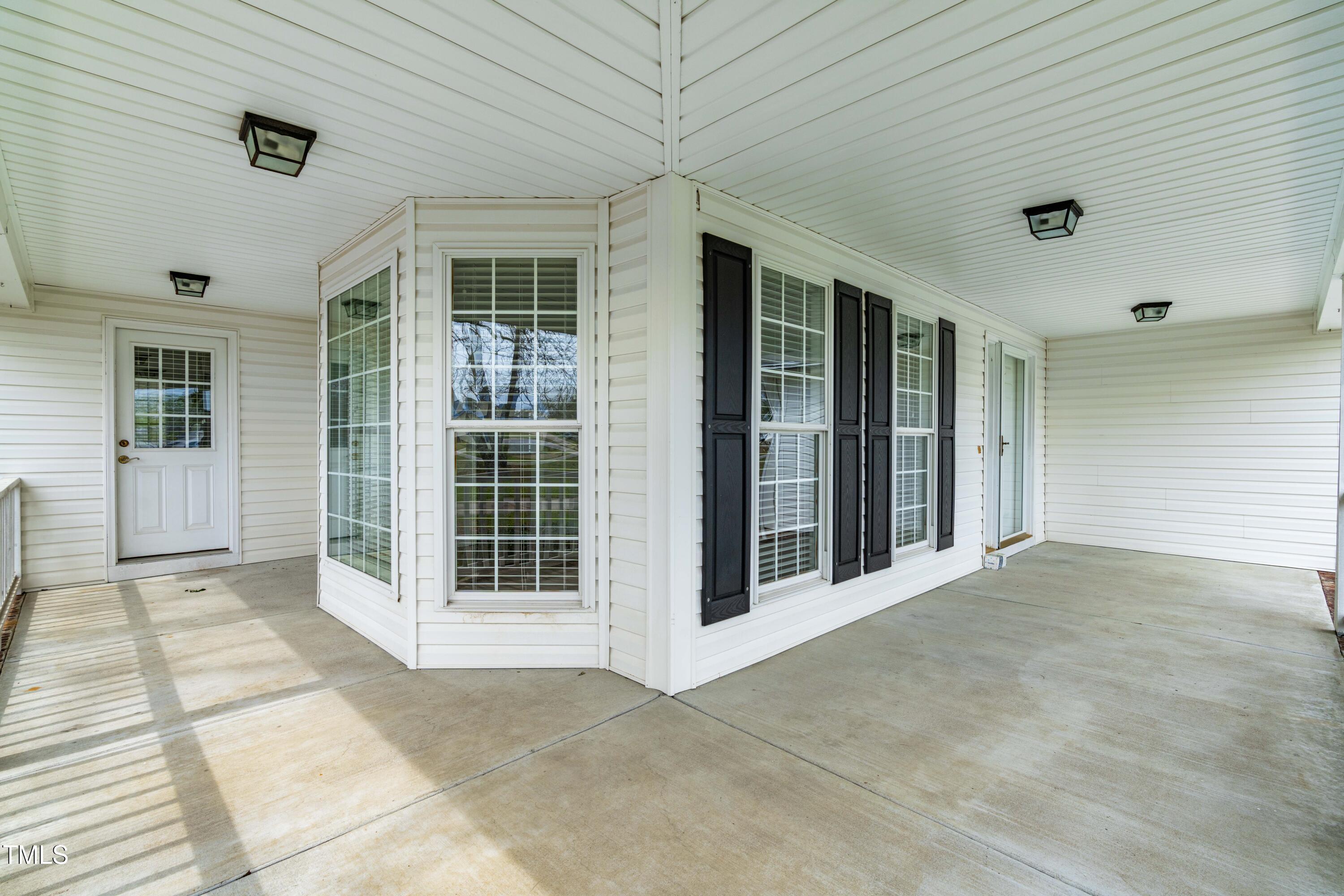 44 Loop Road Archer Lodge, NC 27527 - Photo 42 of 48 a view of an empty room with windows
