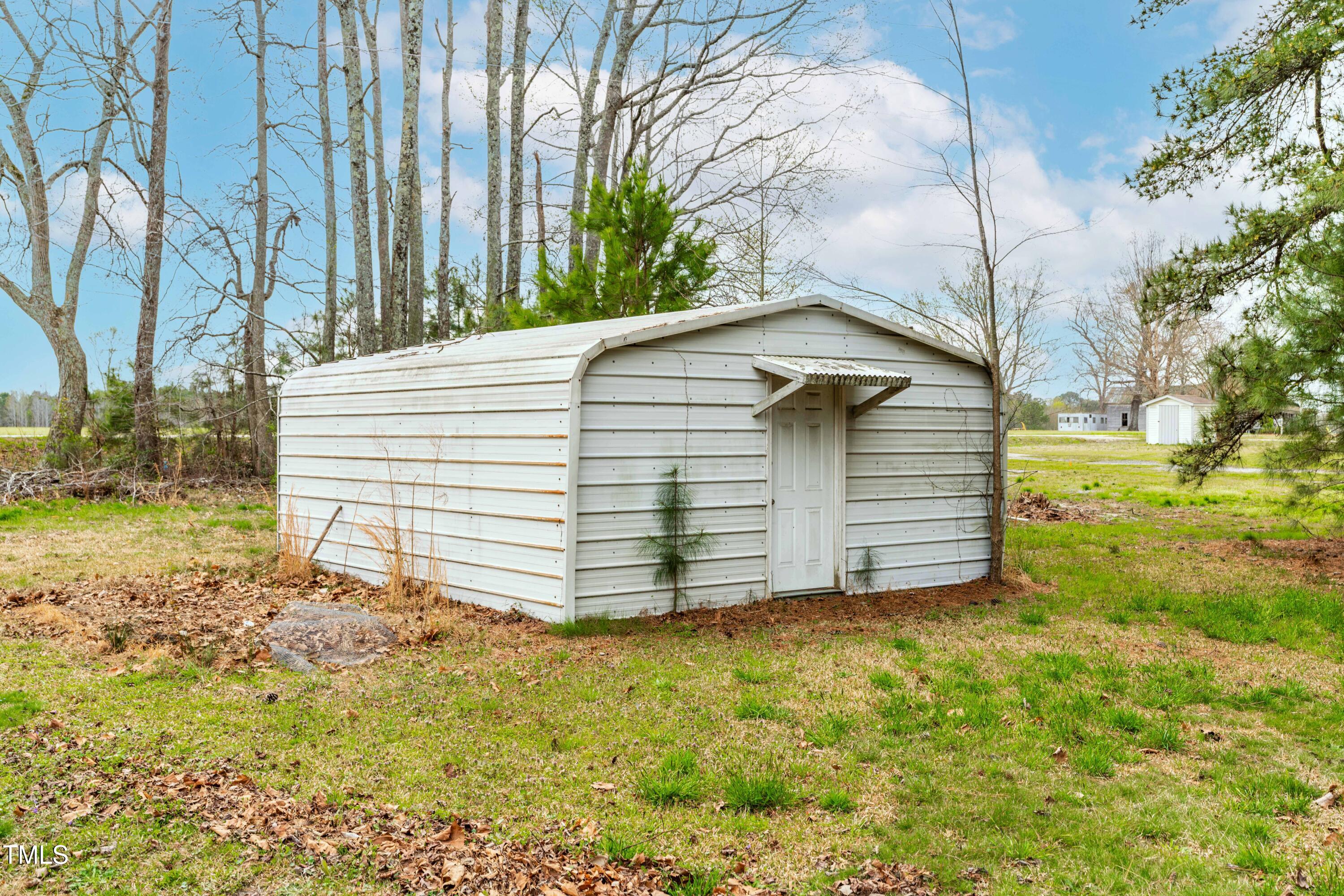 44 Loop Road Archer Lodge, NC 27527 - Photo 45 of 48 a house view with a backyard space