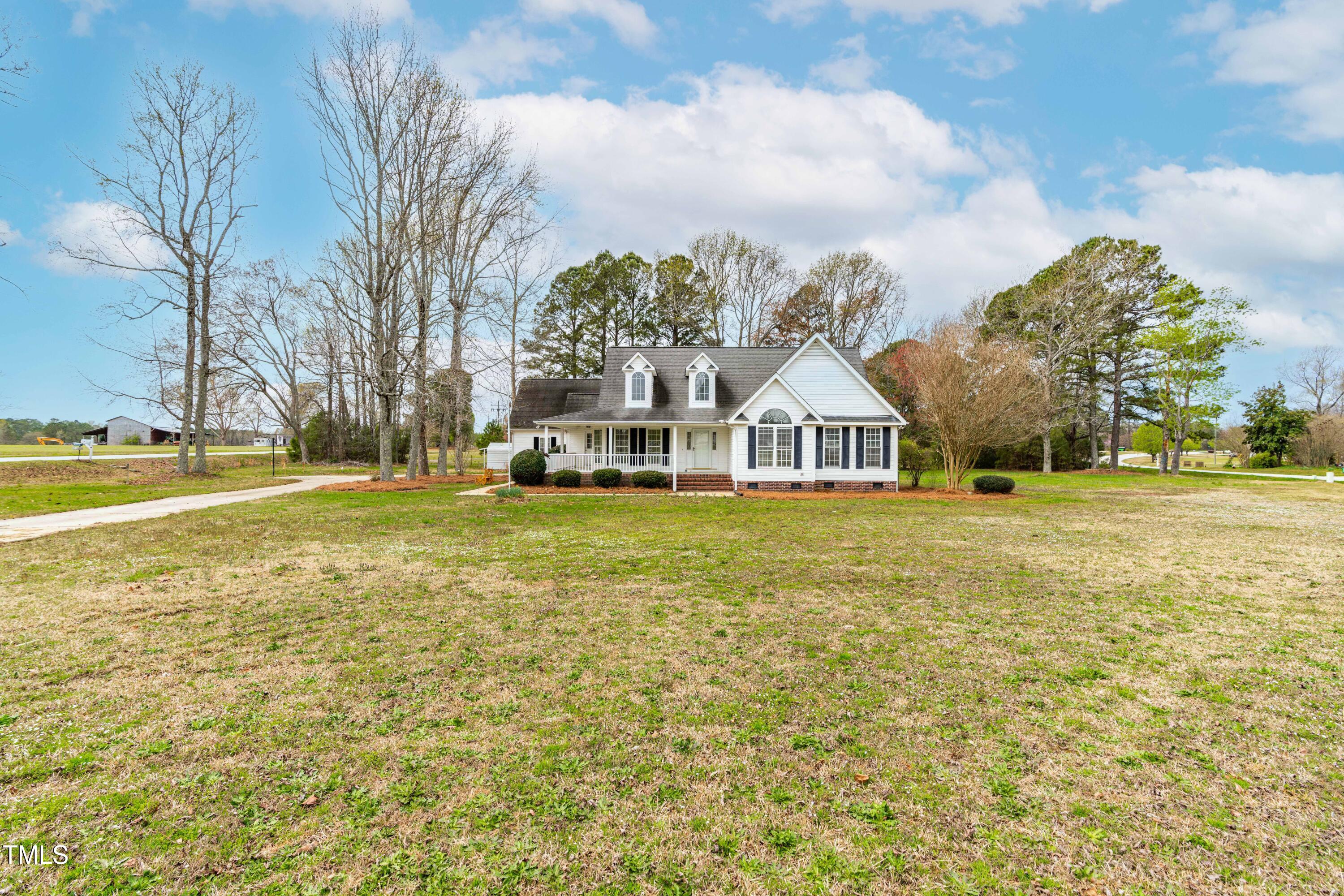44 Loop Road Archer Lodge, NC 27527 - Photo 5 of 48 a view of a house with a yard