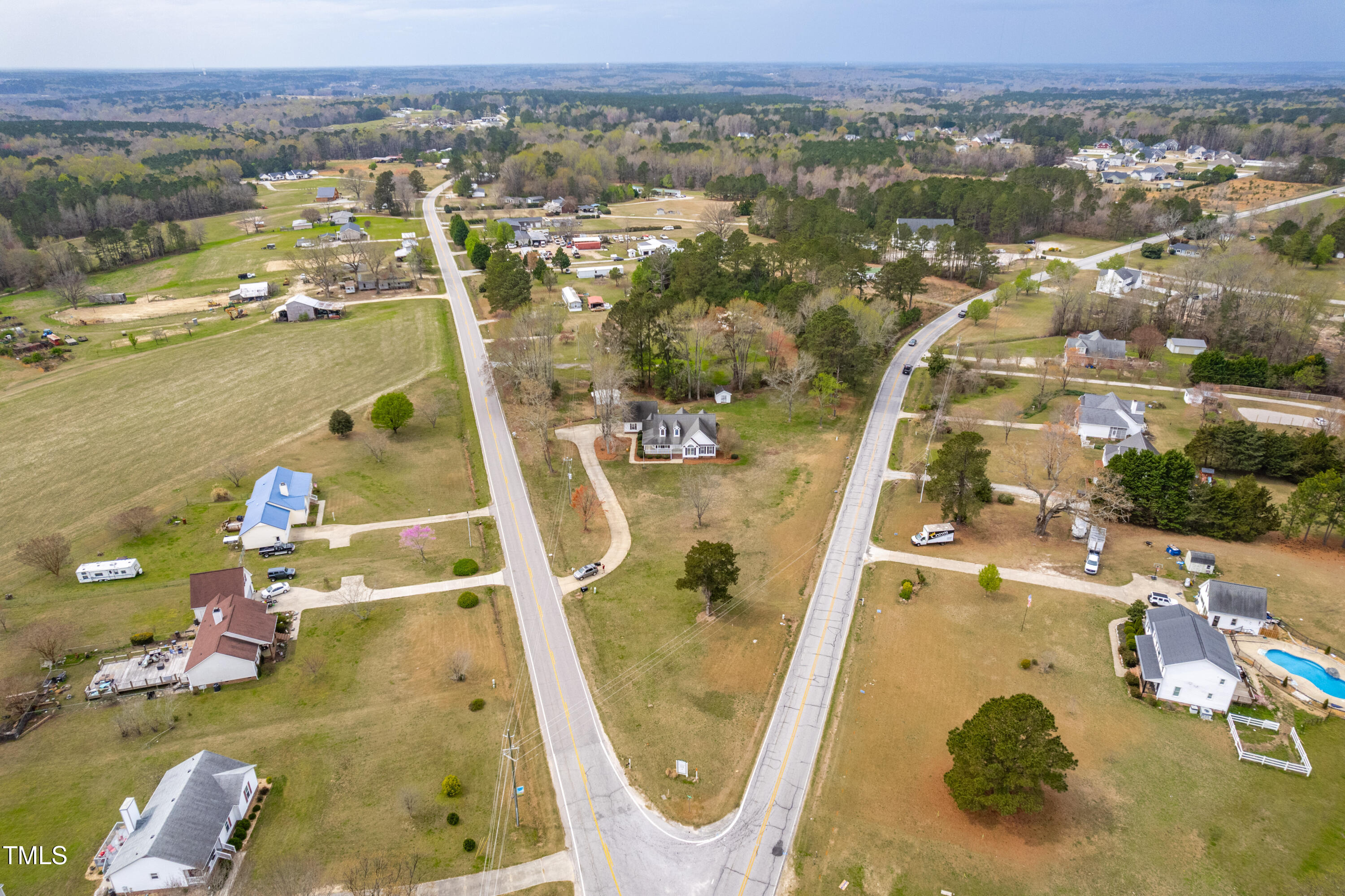 44 Loop Road Archer Lodge, NC 27527 - Photo 7 of 48 an aerial view of residential houses with outdoor space