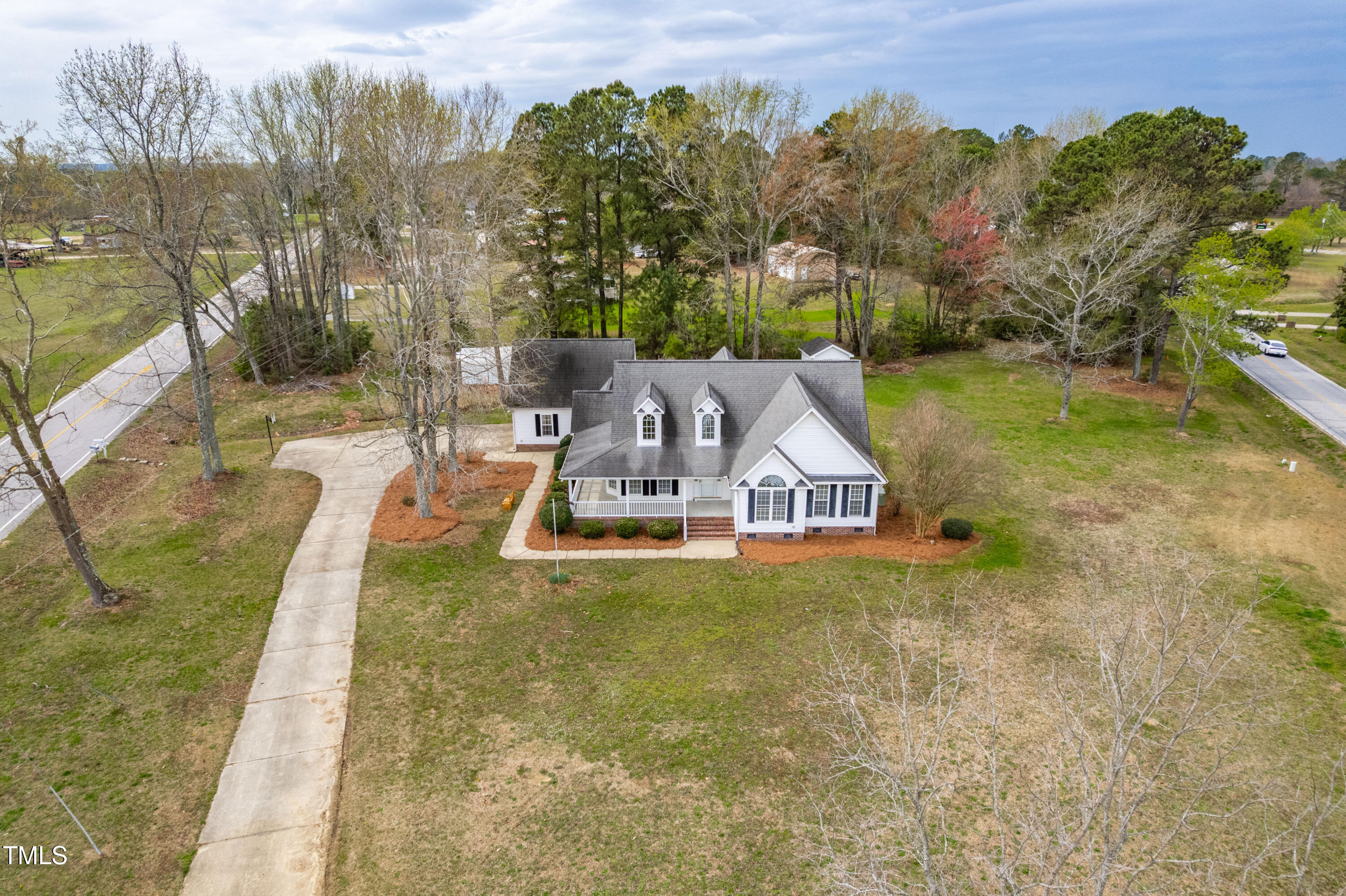 44 Loop Road Archer Lodge, NC 27527 - Photo 8 of 48 a view of a house with a yard