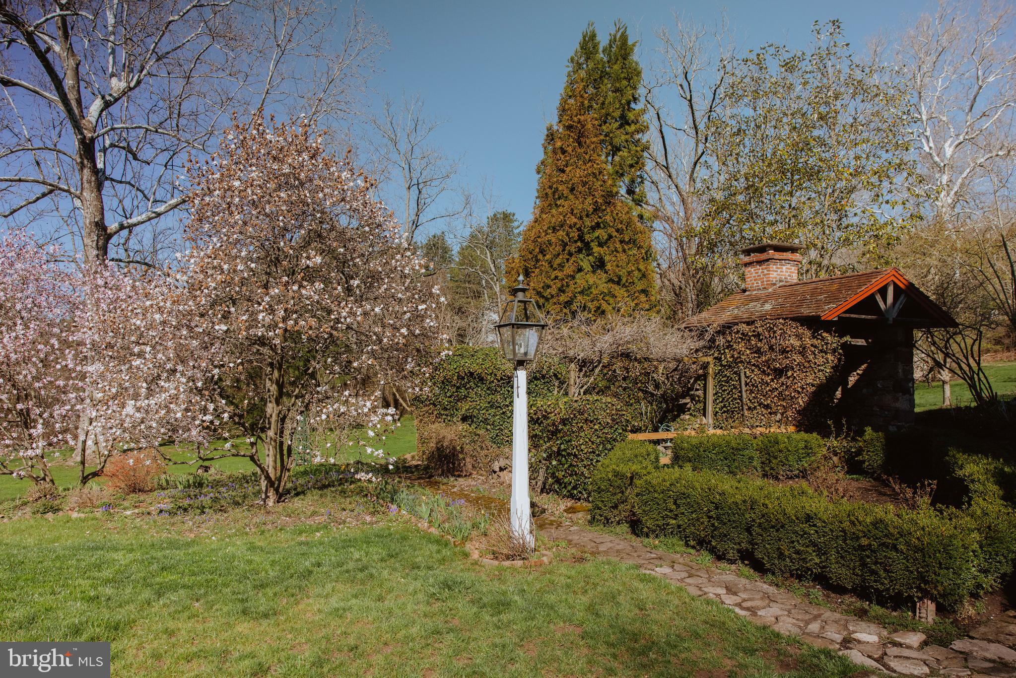 1861 Ridge Road Pottstown, PA 19465 - Photo 67 of 71 Looking from Stone Walkway Behind Smokehouse