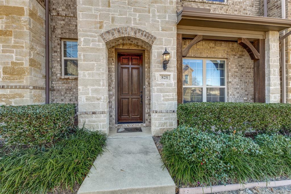 828 Rohan Drive Richardson, TX 75081 - Photo 2 of 25 front view of a brick house with a small yard