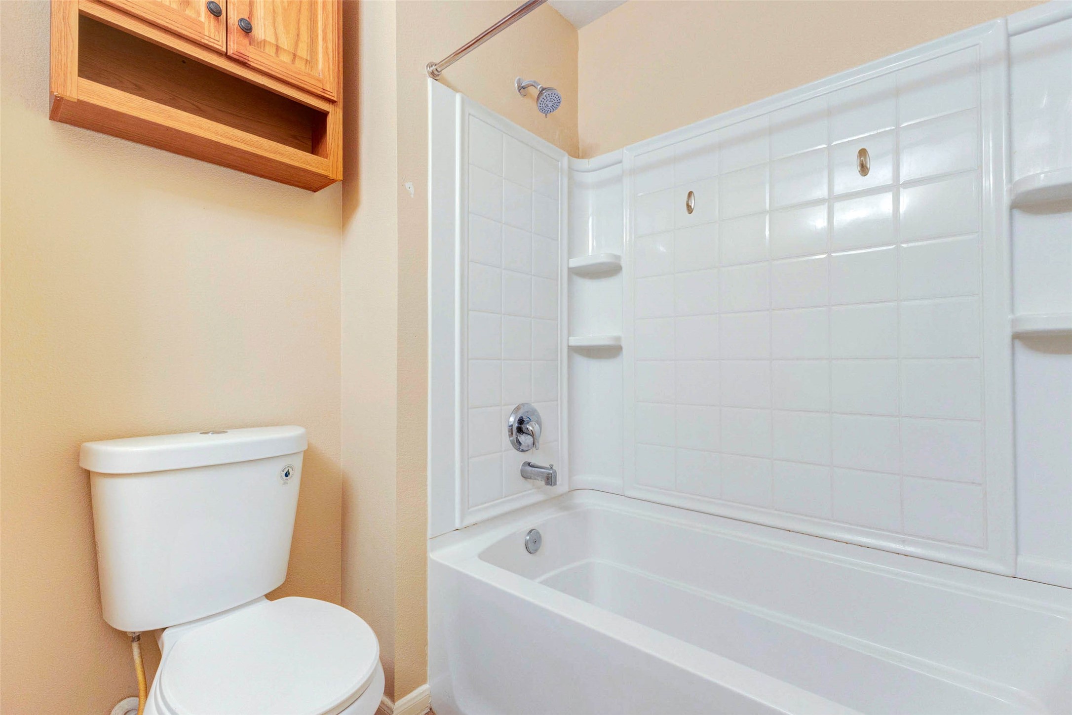 14522 Durham Chase Lane Houston, TX 77095 - Photo 23 of 40 a white toilet sitting next to a bath tub