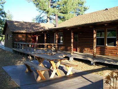 60944 Devils Ladder Road Mountain Center, CA 92561 - Photo 5 of 8 a view of a chairs and table in the patio