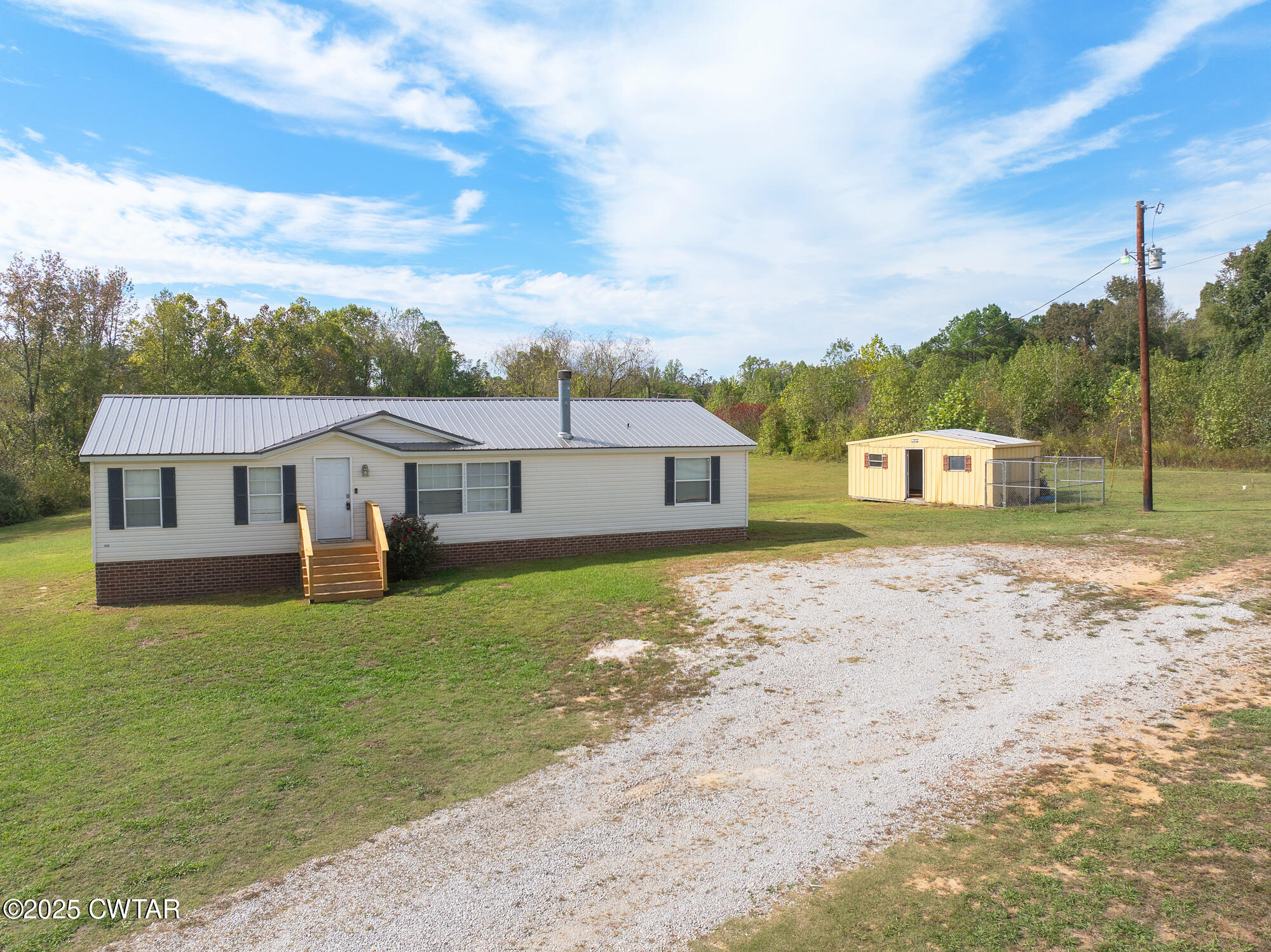 1825 Island Road Beech Bluff, TN 38313 - Photo 2 of 33 DJI_20251017141618_0324_D
