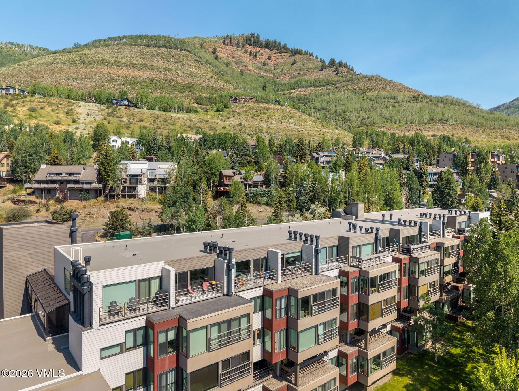 1100 North Frontage Road West, Unit 1503 Vail, CO 81657 - Photo 30 of 32 a view of city with tall buildings