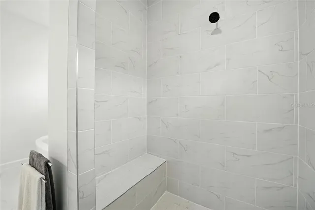 a bathroom with a sink a toilet and a bathtub